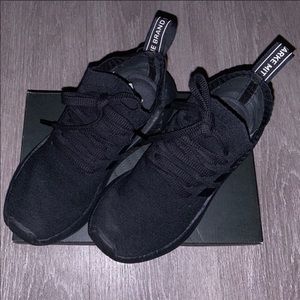 Black adidas triple NMD